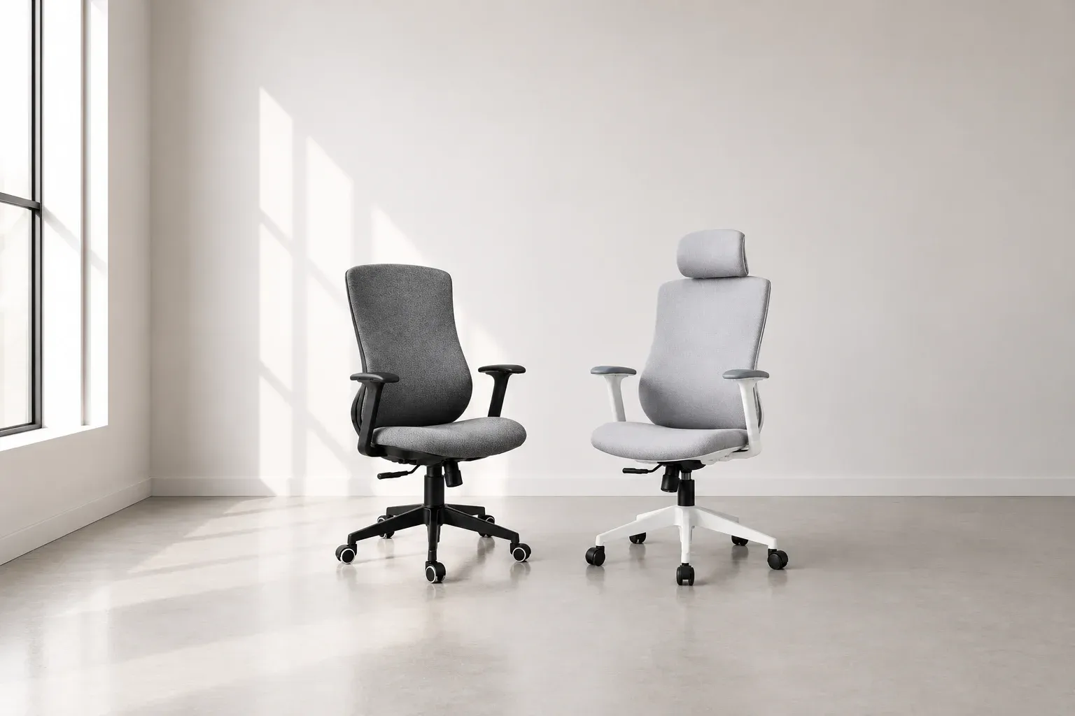 Two Zumax office chairs in charcoal and light grey fabric in a bright room