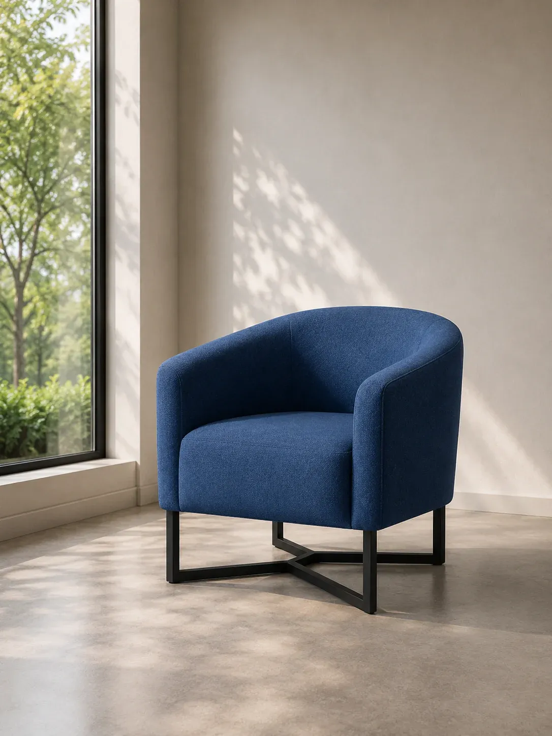 Navy blue tub lounge chair on a black cross base